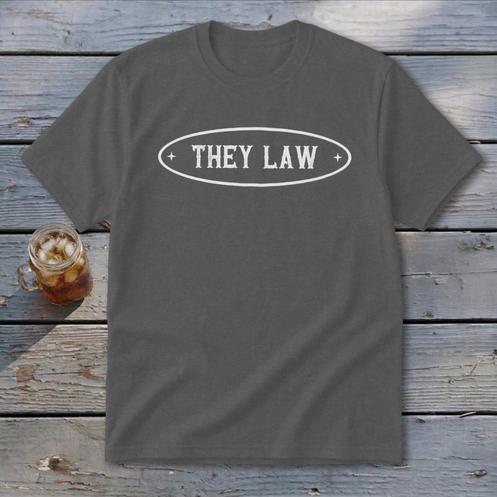 Grey t-shirt with "THEY LAW" text inside a white oval emblem.