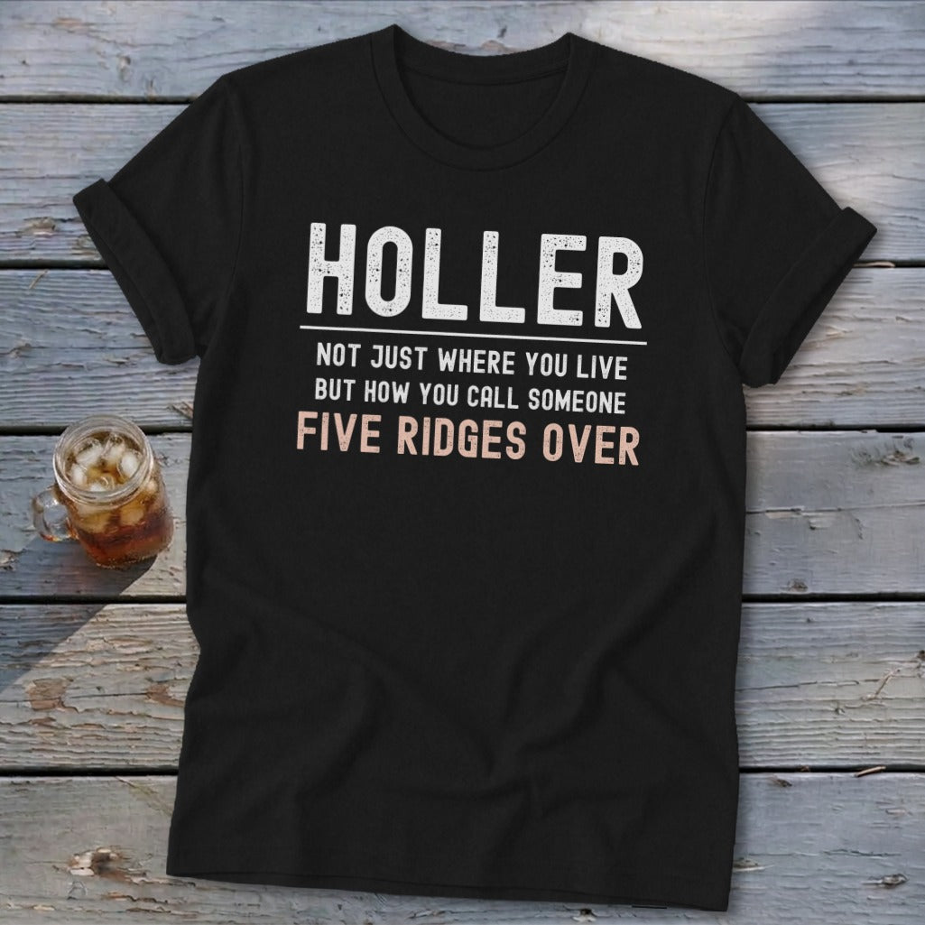 Black t-shirt with text: Holler not just where you live but how you call someone five ridges over.