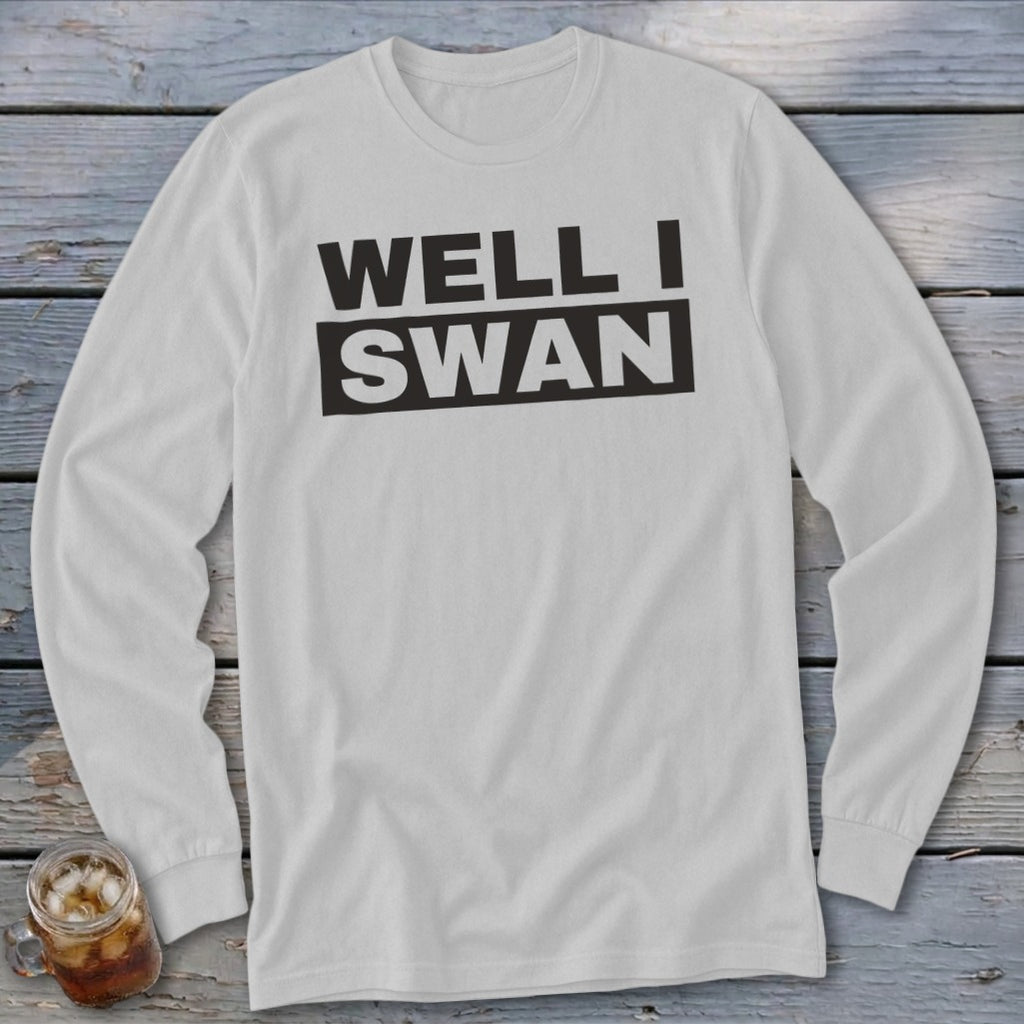 Light gray long-sleeve t-shirt with the black text WELL I SWAN printed across the chest.