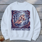 Ghost in spooky forest with text "The Haints Ain't Left"