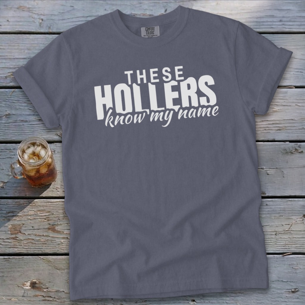 Gray t-shirt with white text that reads "THESE HOLLERS know my name."