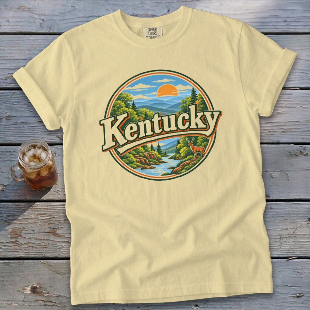 Light yellow t-shirt with circular "Kentucky" landscape graphic and deer.