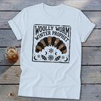 White t-shirt featuring a black graphic of a woolly worm with text reading Woolly Worm Winter Prophet.