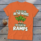 Orange t-shirt featuring graphic art of ramps and the text If You See Me in the Woods I'm Huntin' Ramps.