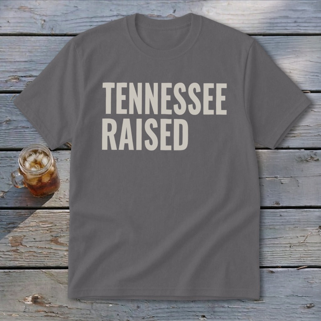 Gray t-shirt with "TENNESSEE RAISED" in white text