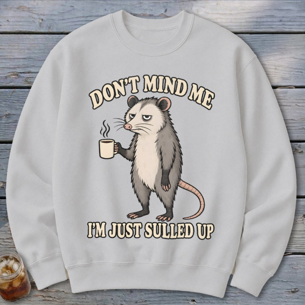 Light grey sweatshirt with opossum graphic and text "Don't mind me I'm just sulled up."