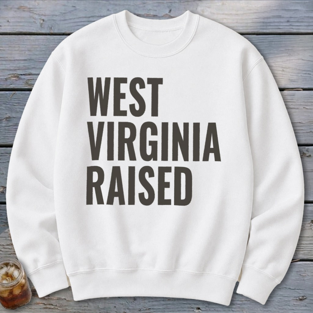 White crewneck sweatshirt with "WEST VIRGINIA RAISED" text.