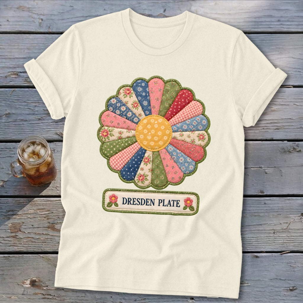 Cream t-shirt with a colorful Dresden Plate floral design and text.