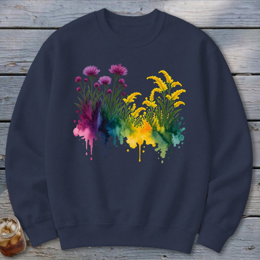 Navy sweatshirt with a watercolor floral design featuring pink and yellow wildflowers.