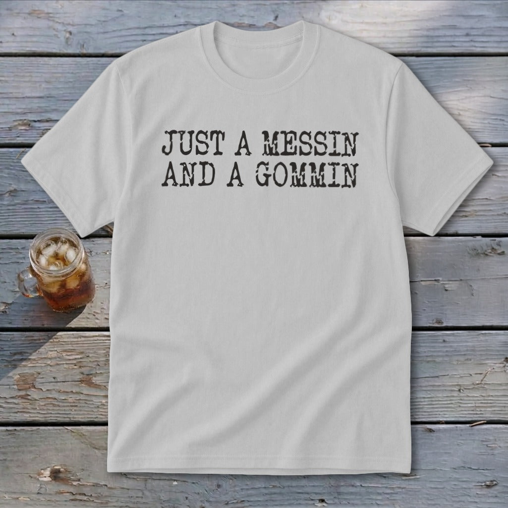 White t-shirt with black text reading "JUST A MESSIN AND A GOMMIN".