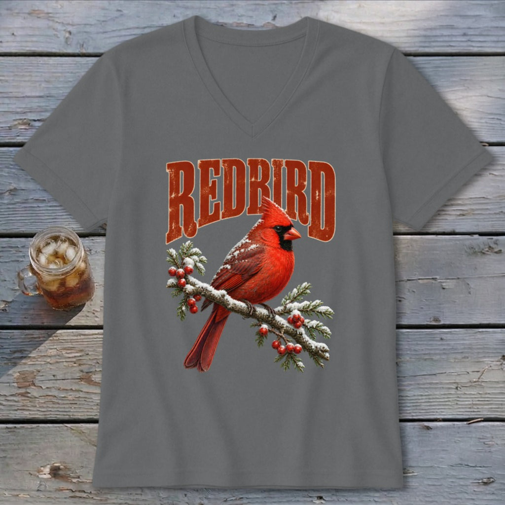 A dark gray V-neck t-shirt featuring a red cardinal on a snowy branch with the text "REDBIRD".