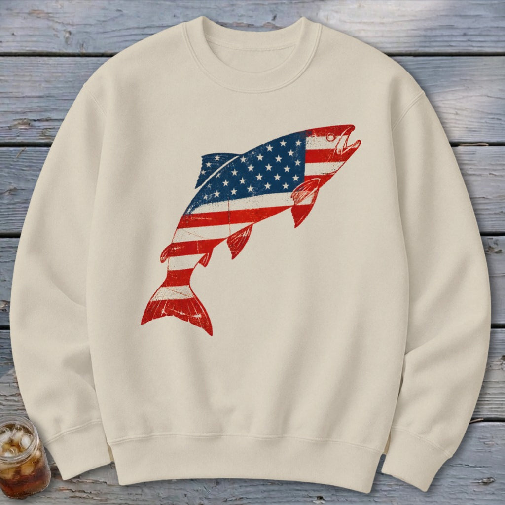 Off-white crewneck sweatshirt featuring a distressed graphic of a jumping fish patterned with the American flag.