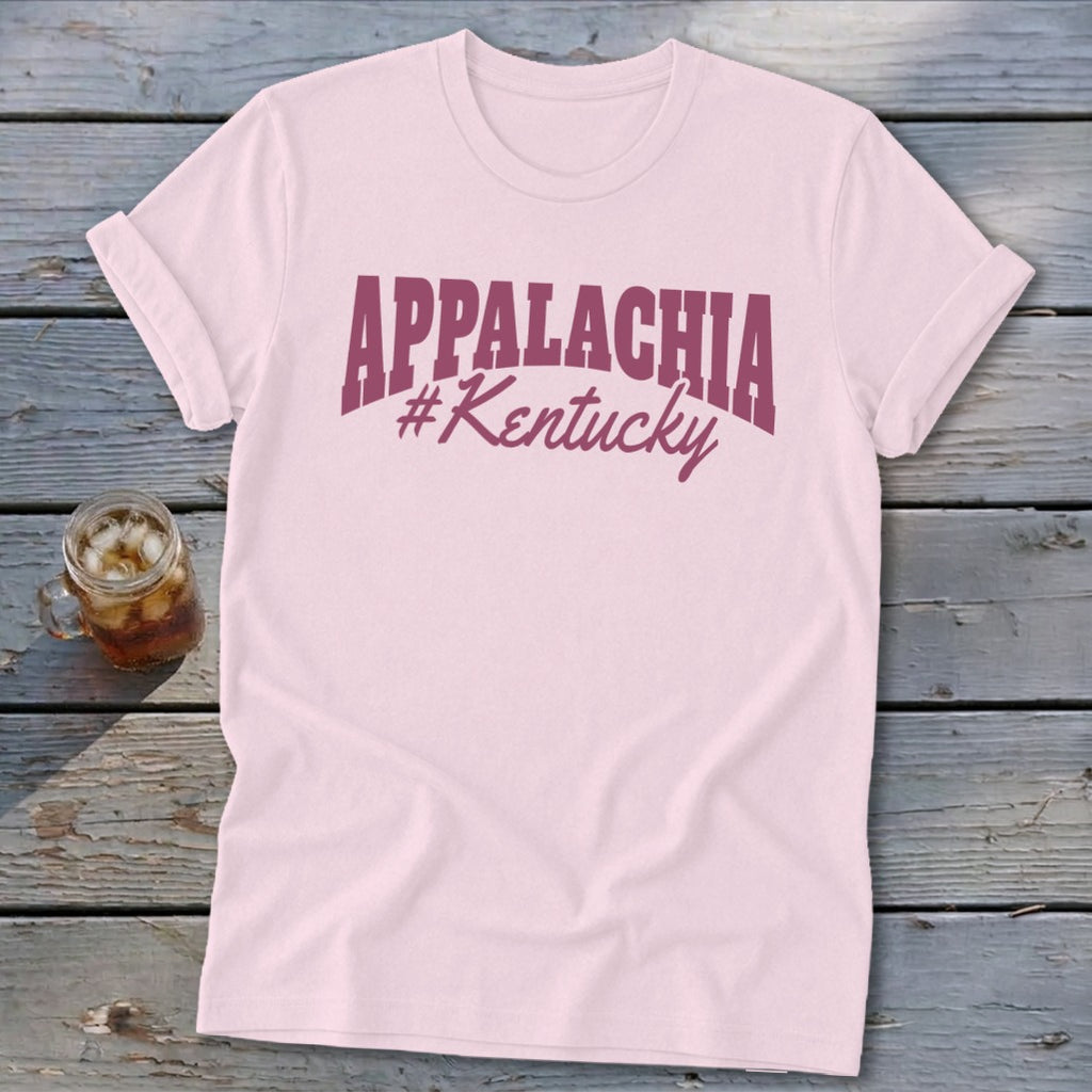 Pink t-shirt with "APPALACHIA #Kentucky" text and a glass of iced beverage.