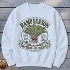 White sweatshirt with "Ramp Season" graphic featuring ramps, mountains, and text.
