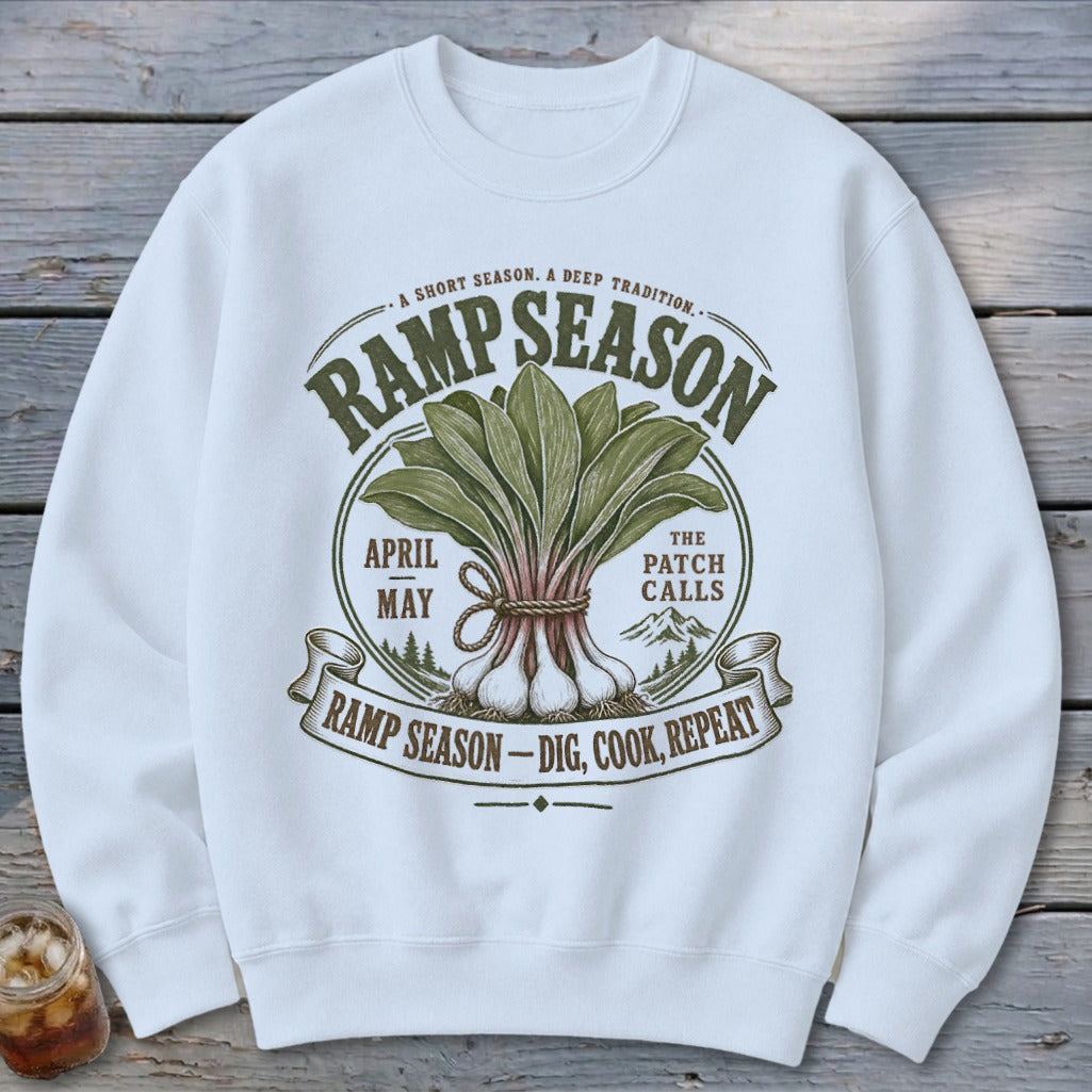 White sweatshirt with "Ramp Season" graphic featuring ramps, mountains, and text.