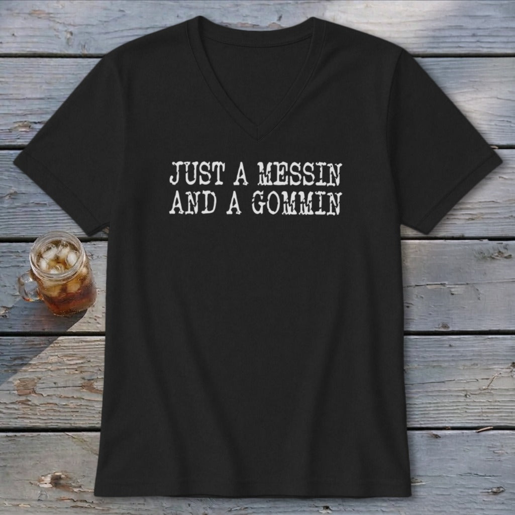 Black v-neck t-shirt with "JUST A MESSIN AND A GOMMIN" printed in white.
