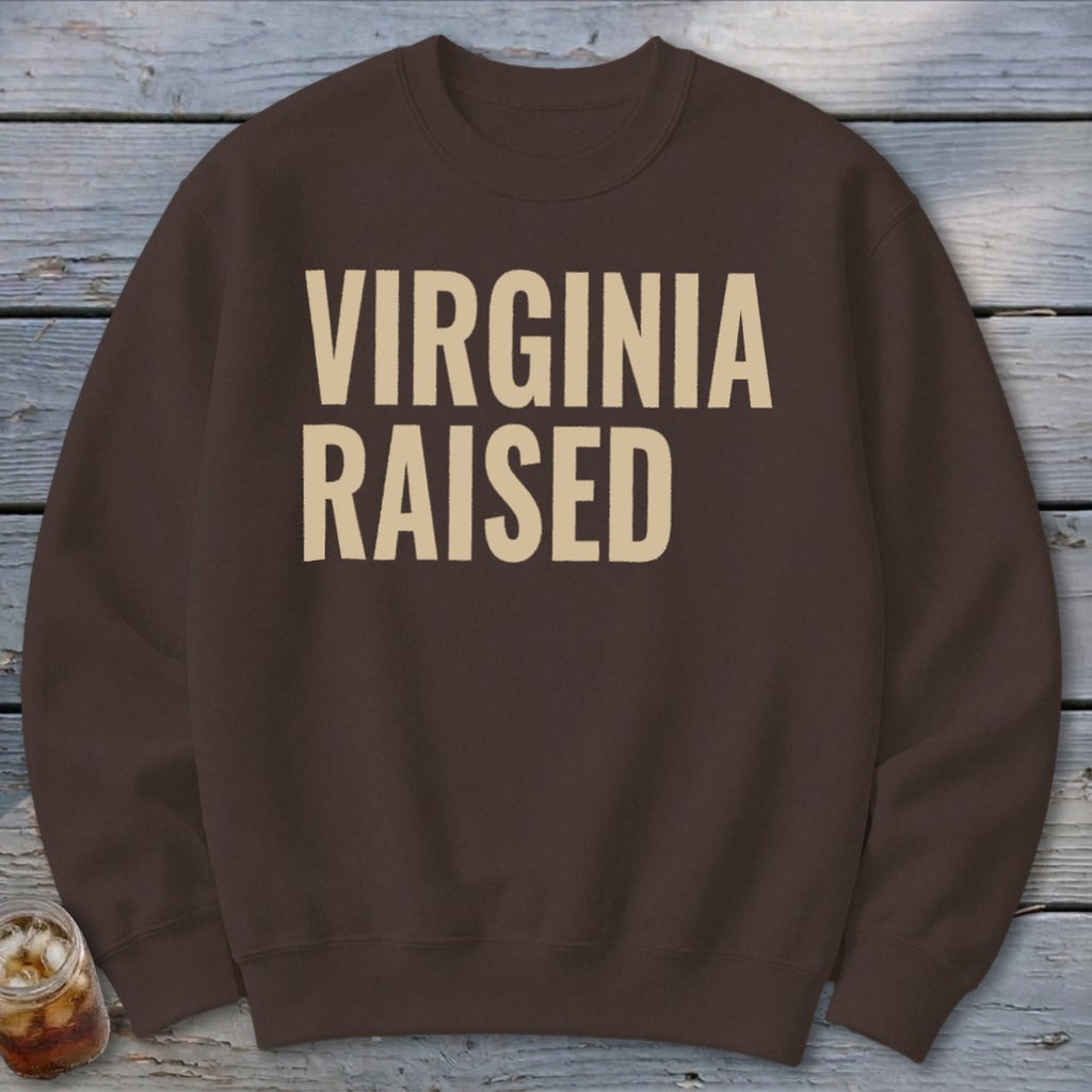 Brown sweatshirt with "Virginia Raised" text in beige letters.