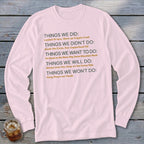 Pink long-sleeve shirt with list of "Things We Did" and other sayings printed in gray and orange text.