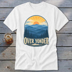 White crewneck t-shirt featuring a vintage mountain landscape graphic with the text Over Yonder.