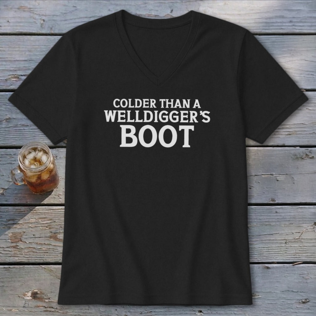 Black v-neck t-shirt with white text that reads "Colder Than A Welldigger's Boot."