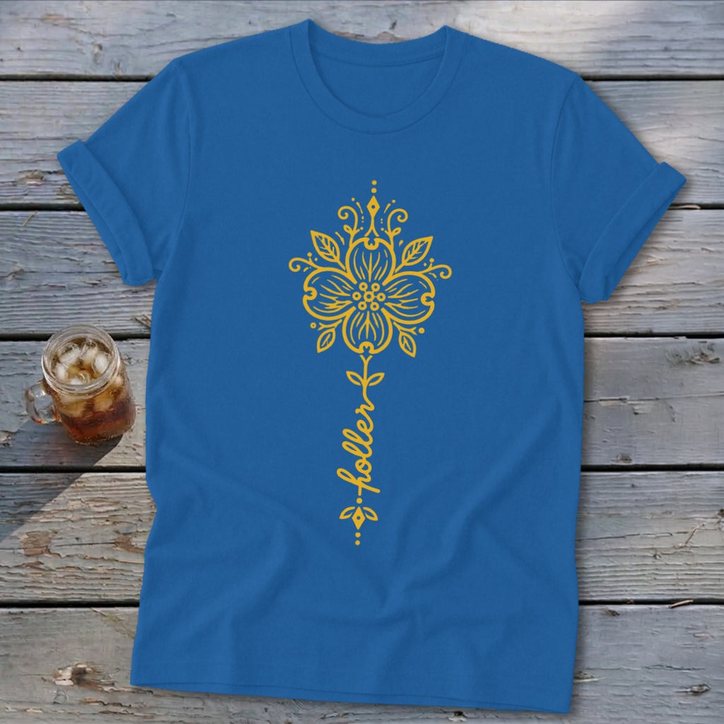 Blue t-shirt with yellow floral design and "holler" text.