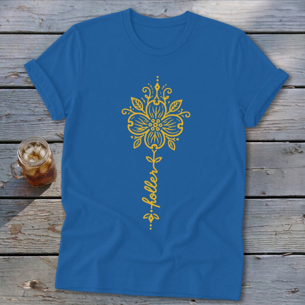 Blue t-shirt with yellow floral design and "holler" text.