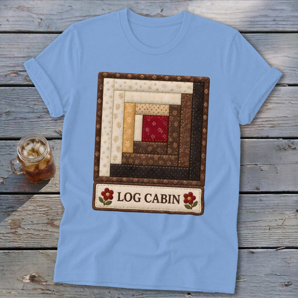 Light blue t-shirt with a quilt-style log cabin square design and "LOG CABIN" text.