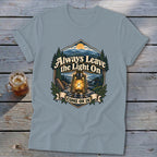 T-shirt with vintage lantern and mountain graphic reading "Always Leave the Light On Come On In."