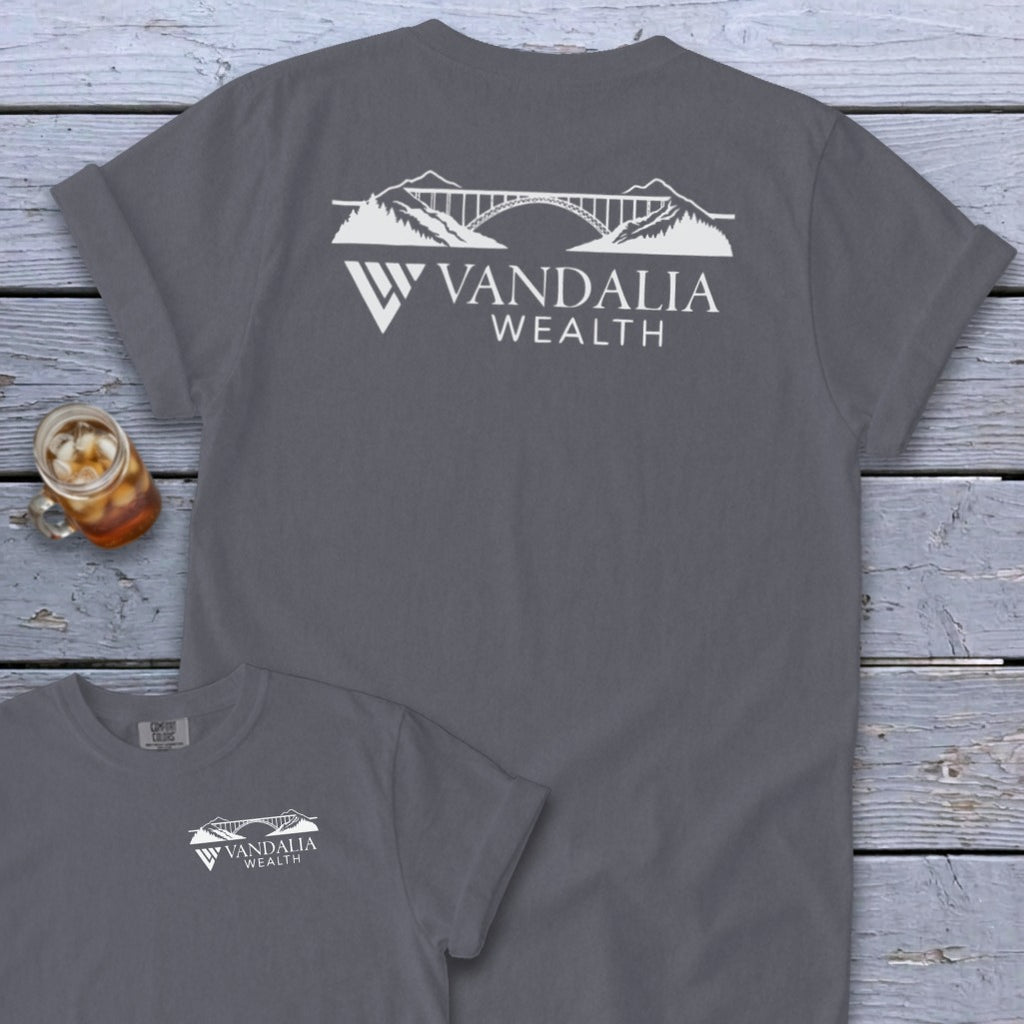 Gray t-shirt with white logo featuring a bridge, mountains, and "Vandalia Wealth" text.