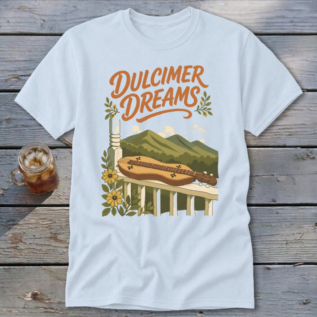 Light blue t-shirt with "Dulcimer Dreams" text over a mountain and porch scene.