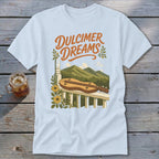 Light blue t-shirt with "Dulcimer Dreams" text over a mountain and porch scene.