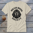 Beige t-shirt with black "Holler Hound Society" text and dog graphic.
