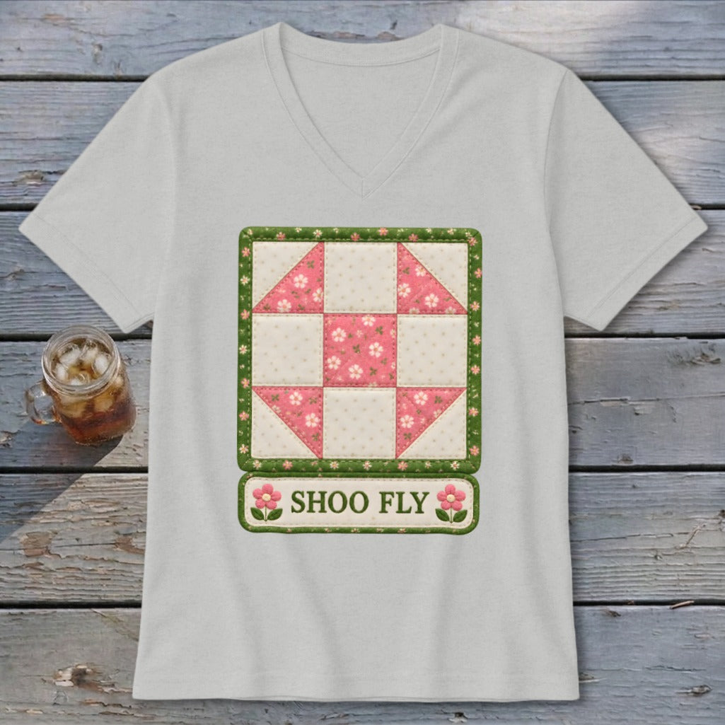 White v-neck t-shirt with a Shoo Fly quilt block design and text.