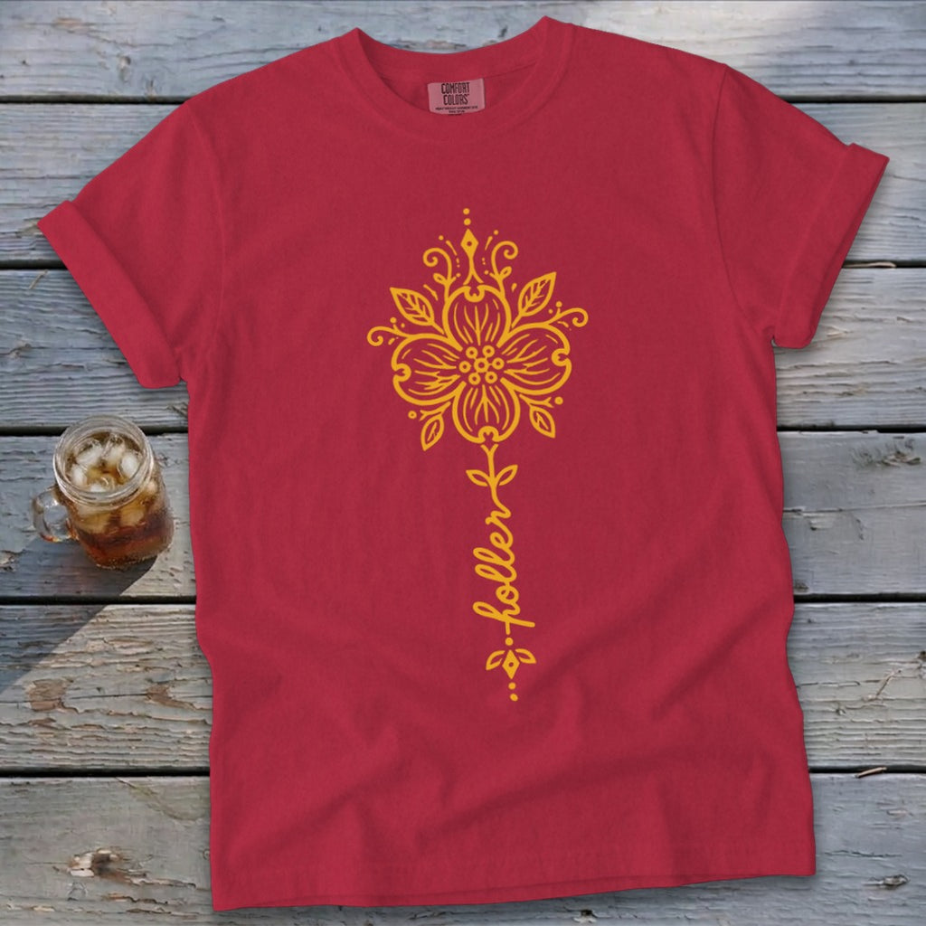 Red t-shirt with yellow floral design and "holler" text.