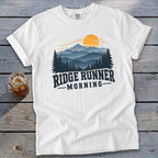 White t-shirt with mountain sunset graphic and text "RIDGE RUNNER MORNING".