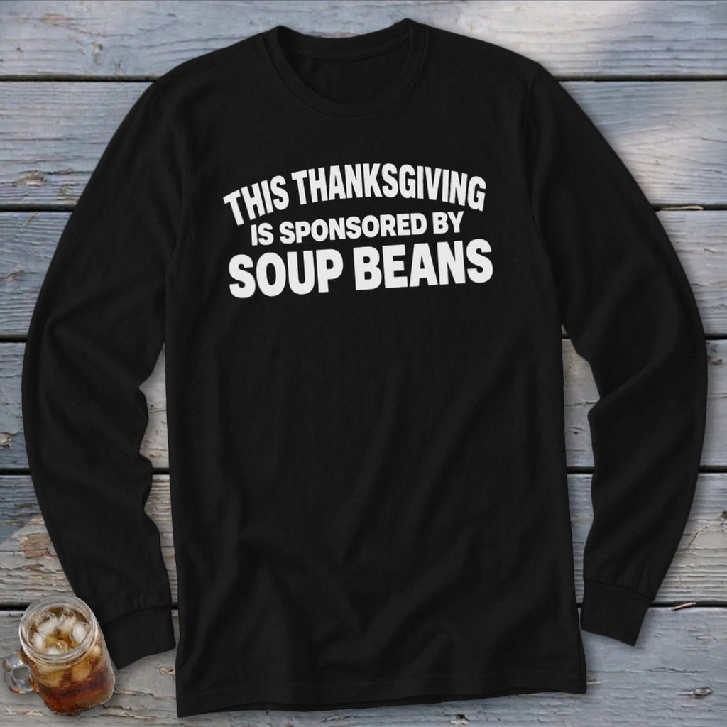 Black long-sleeve t-shirt with white text reading THIS THANKSGIVING IS SPONSORED BY SOUP BEANS.