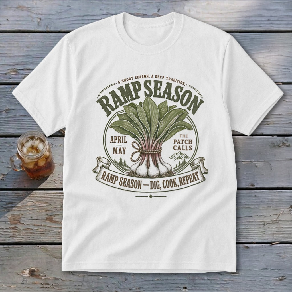 White t-shirt with "Ramp Season" graphic featuring ramps, text, and mountains.