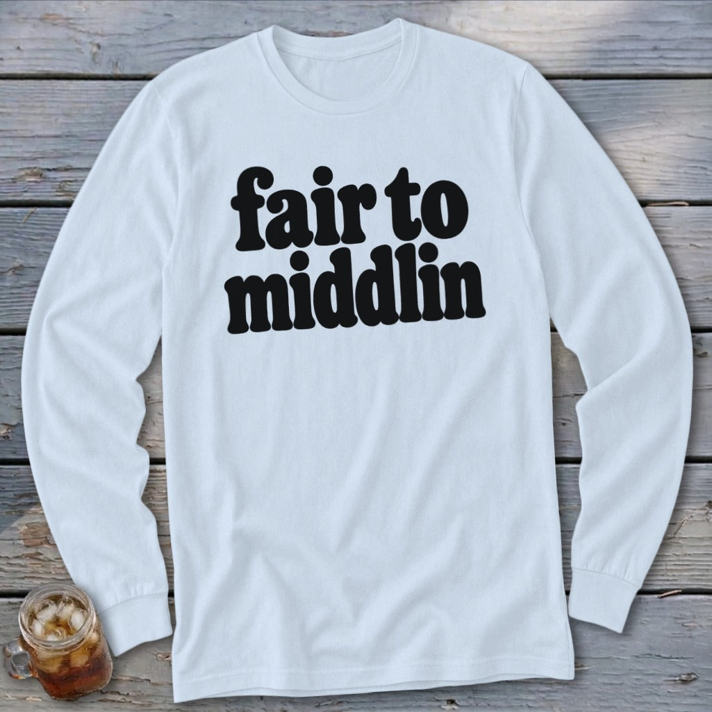 White long-sleeved shirt with black text "fair to middlin".