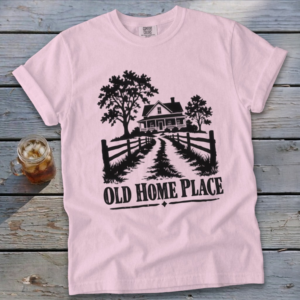 Pink t-shirt with black graphic of a farmhouse and "OLD HOME PLACE" text.