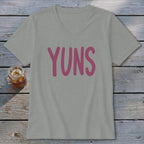 Grey v-neck t-shirt with pink "YUNS" text and iced drink.