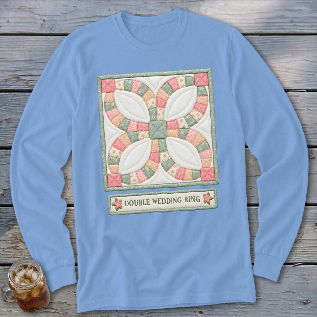 Light blue long sleeve shirt with a Double Wedding Ring quilt pattern and text.
