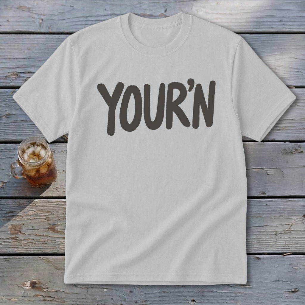 White t-shirt with the word "YOUR'N" in bold, dark grey lettering.