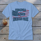 Light blue t-shirt with American flag design and text: VIRGINIA RAISED AMERICAN MADE