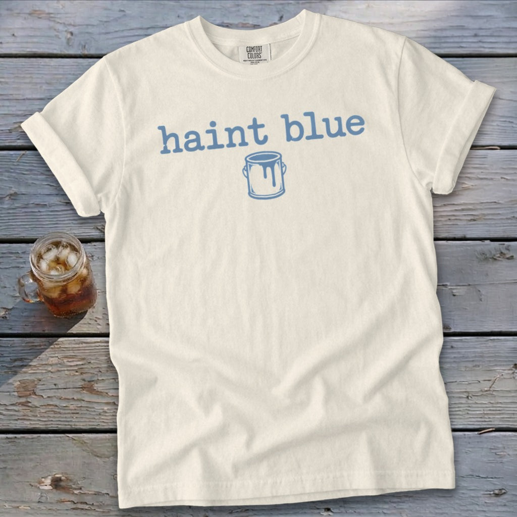 Cream t-shirt with "haint blue" text and a paint can graphic.