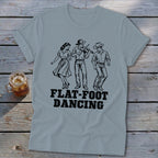 T-shirt with black illustration of three people dancing and "FLAT-FOOT DANCING" text.