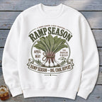 White sweatshirt with "Ramp Season" graphic, depicting ramps and mountains.