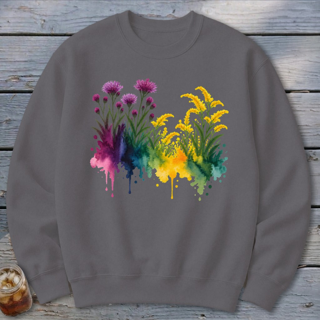 Gray sweatshirt with watercolor floral design of purple and yellow wildflowers.