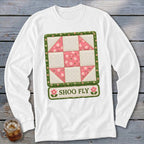 White long-sleeve shirt with a quilted "Shoo Fly" design featuring pink floral patterns.