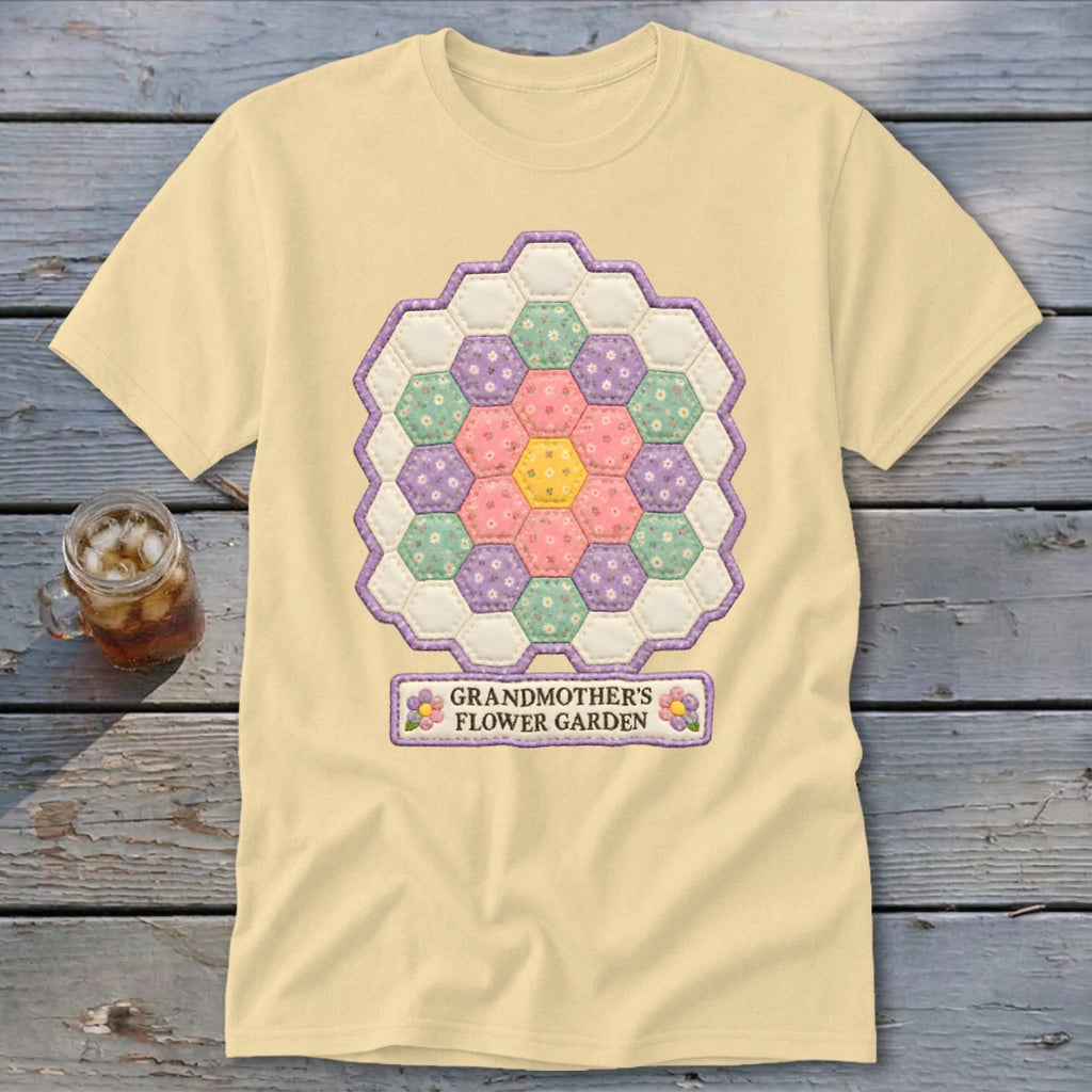 Yellow t-shirt with hexagon flower quilt design and "Grandmother's Flower Garden" text.
