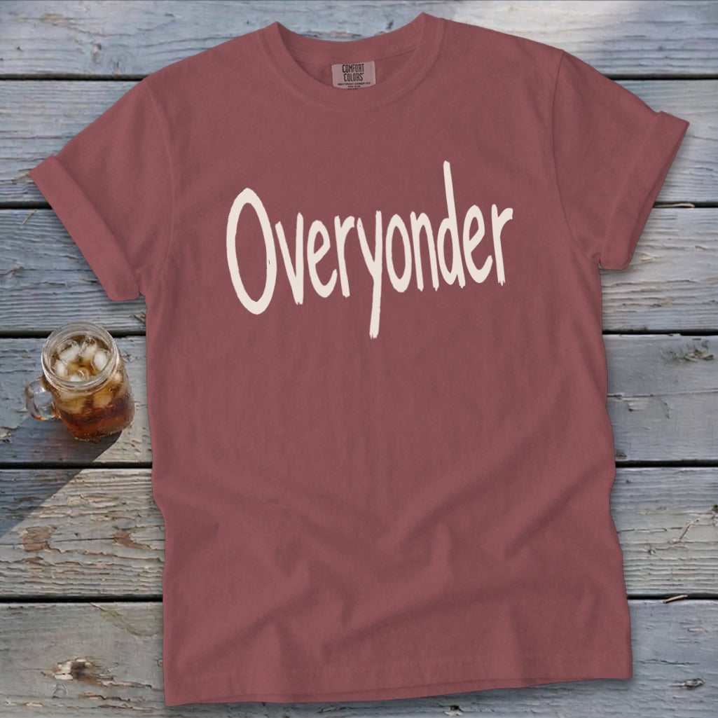Dusty rose Comfort Colors t-shirt with "Overyonder" in white script text.